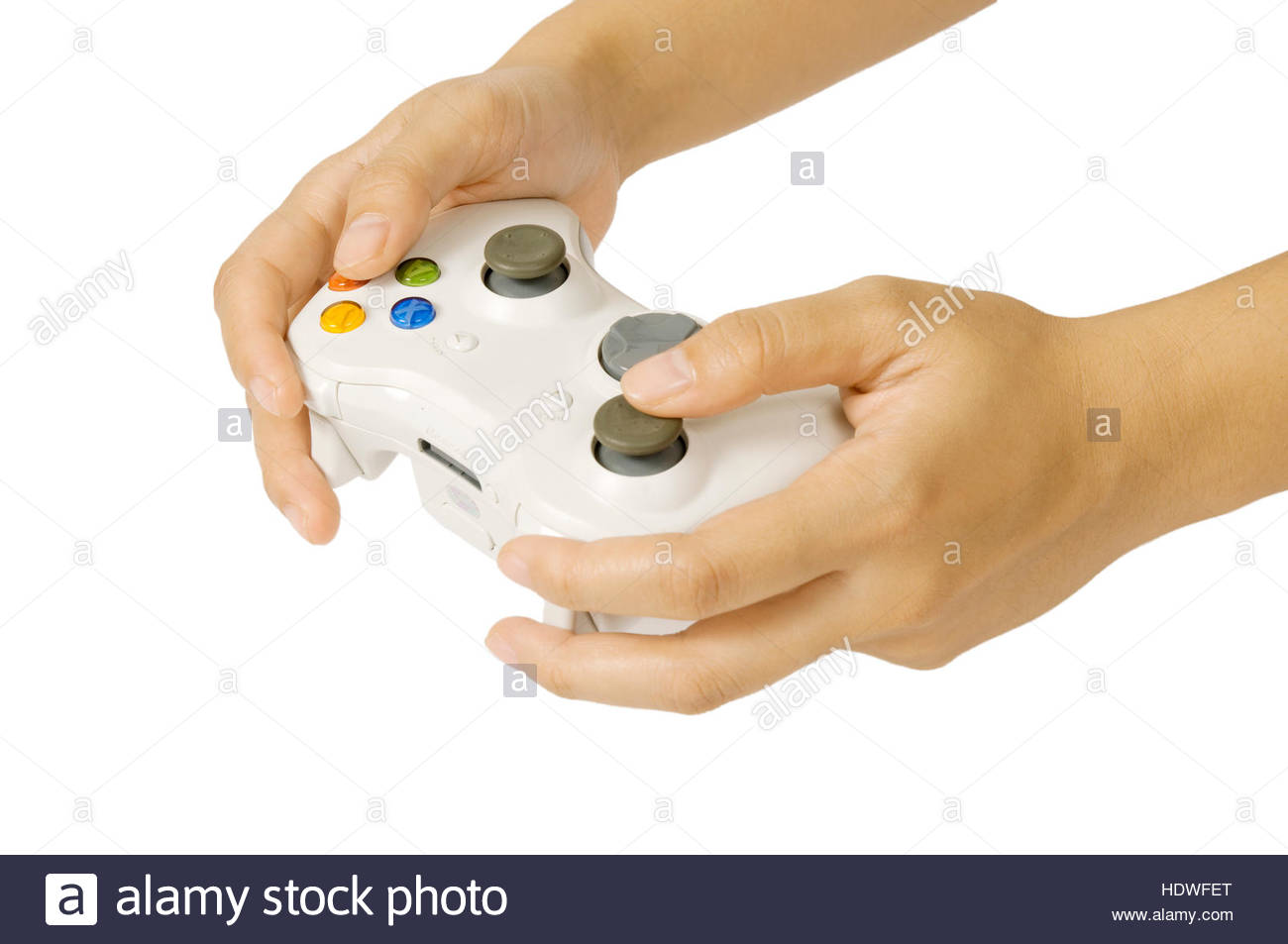 gamepad-hold-by-human-hand-isolated-over-white-background-HDWFET.jpg