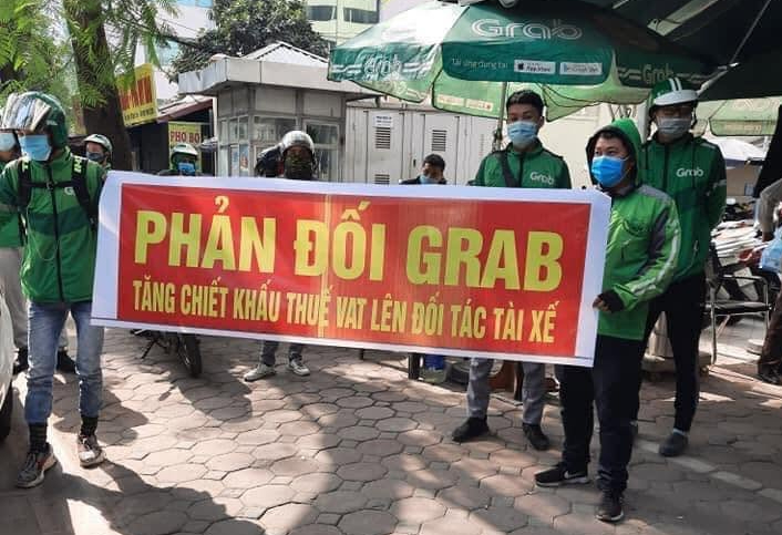 Việt Nam có nên yêu cầu Grab giảm chiết khấu như Indonesia để bảo vệ tài xế?- Ảnh 1.