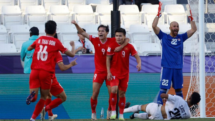 Cầu thủ Việt Nam ăn mừng bàn thắng vào lưới Iraq - Ảnh: AFP